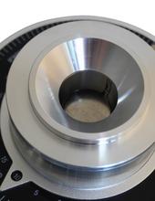 Close-up of a metallic component on a white background