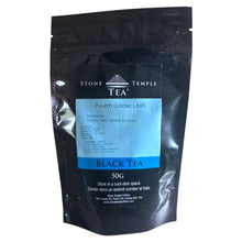 Black tea Pu-erh loose leaf package with Stone Temple Tea branding on a white background