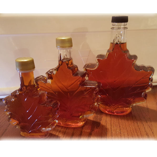Organic maple syrup in leaf-shaped bottles