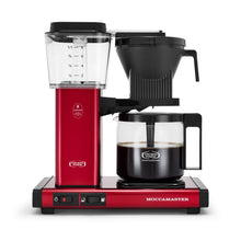 Red Moccamaster coffee maker on a white background