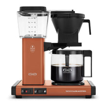 Moccamaster coffee maker with brown base and black components on a white background