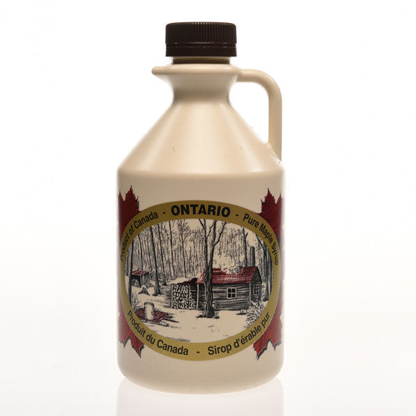Organic maple syrup in plastic containers