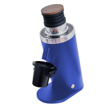 Blue single dose coffee grinder device with wooden top and black components on a white background