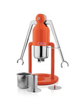 Orange manual espresso machine with metal components on a white background