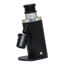 Black and silver coffee grinder on a white background