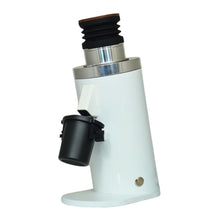 White coffee grinder holder with black and silver components on a white background