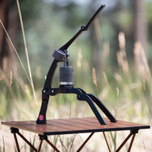 Portable  Flair GO – The Ultimate Portable Lever Espresso Machine on a wooden table with a natural background