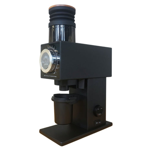 Black coffee grinder on a white background