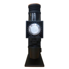 Coffee grinder with manual display on a white background