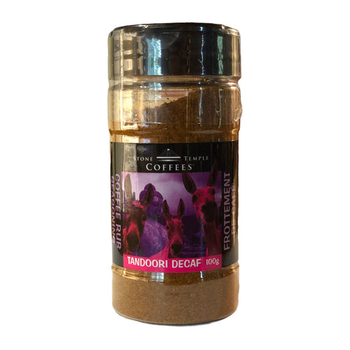 A jar of Stone Temple Coffees Tandoori Decaf Coffee Rub Seasoning with a label showing the product name and an image of spices.
